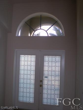 8349 Bahamas Road Fort Myers, FL 33967 - Photo 3 of 10 a decorative lighting & window in a room