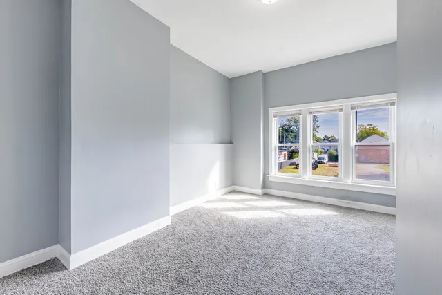 an empty room with windows