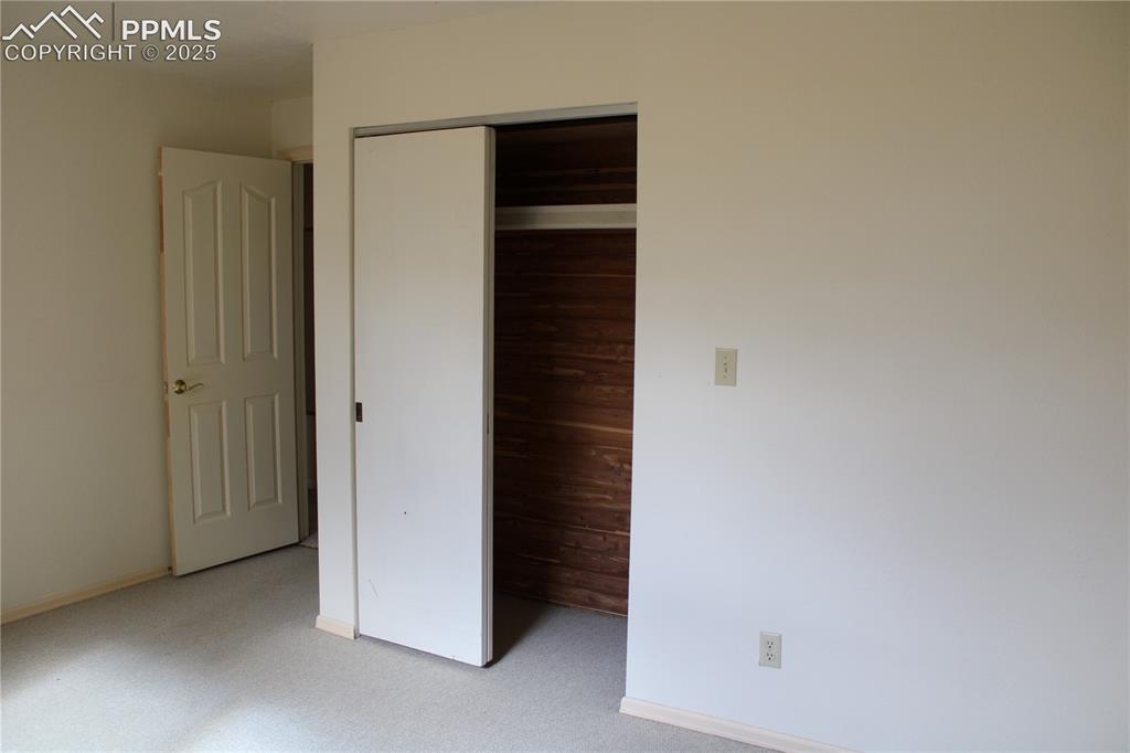 8340 Piute Road Colorado Springs, CO 80926 - Photo 34 of 48 Both lower bedrooms have cedar lined closets.