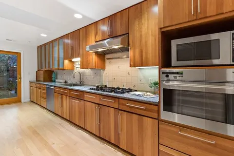a view of a porch with furniture