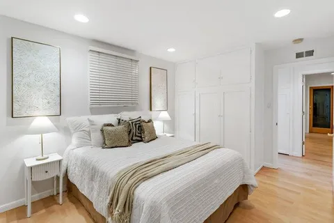 a view of swimming pool with outdoor seating