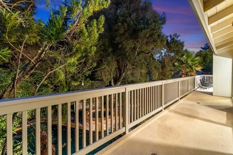 a view of a backyard with a garden