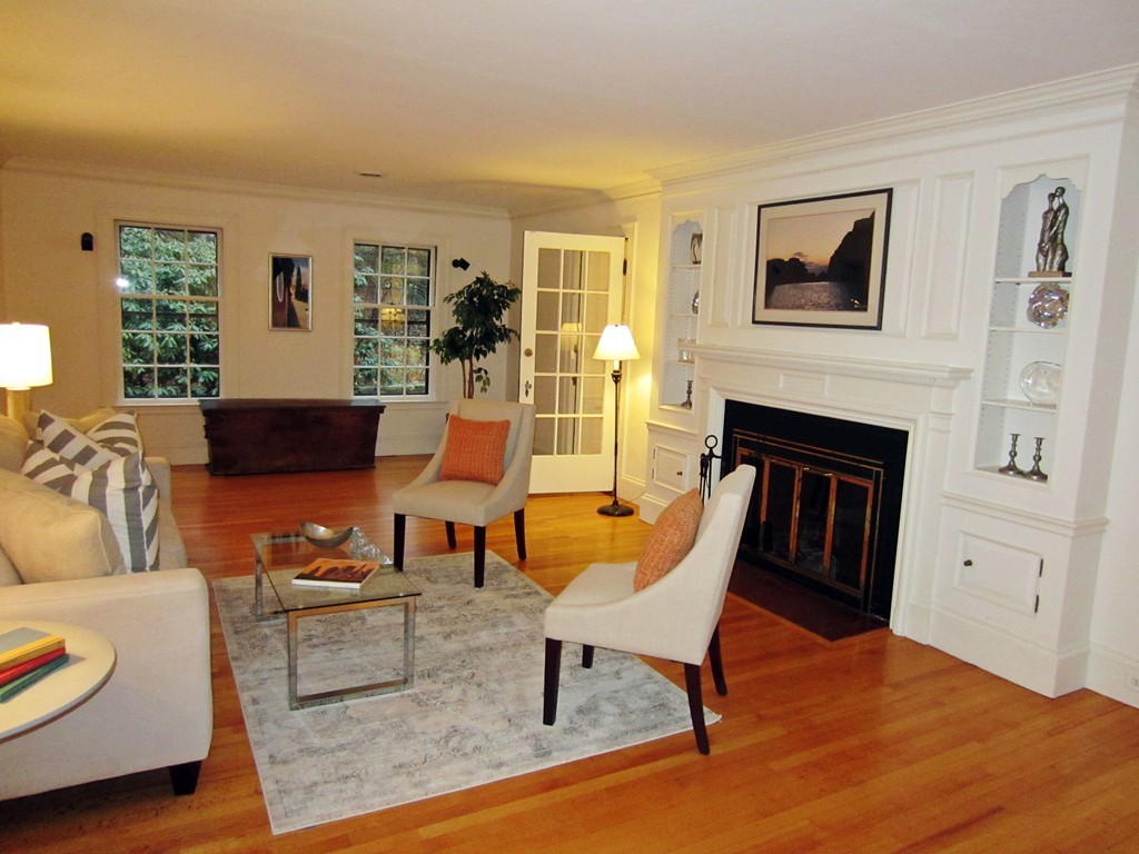 5 Lanark Road Wellesley, MA 02481 - Photo 3 of 18 a living room with furniture and a fireplace