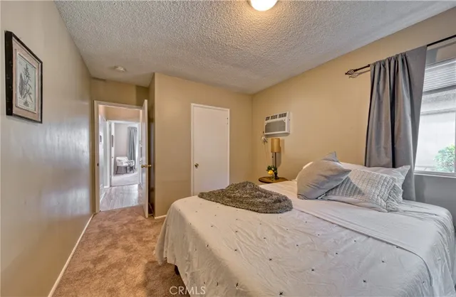 a view of a house with backyard and garden