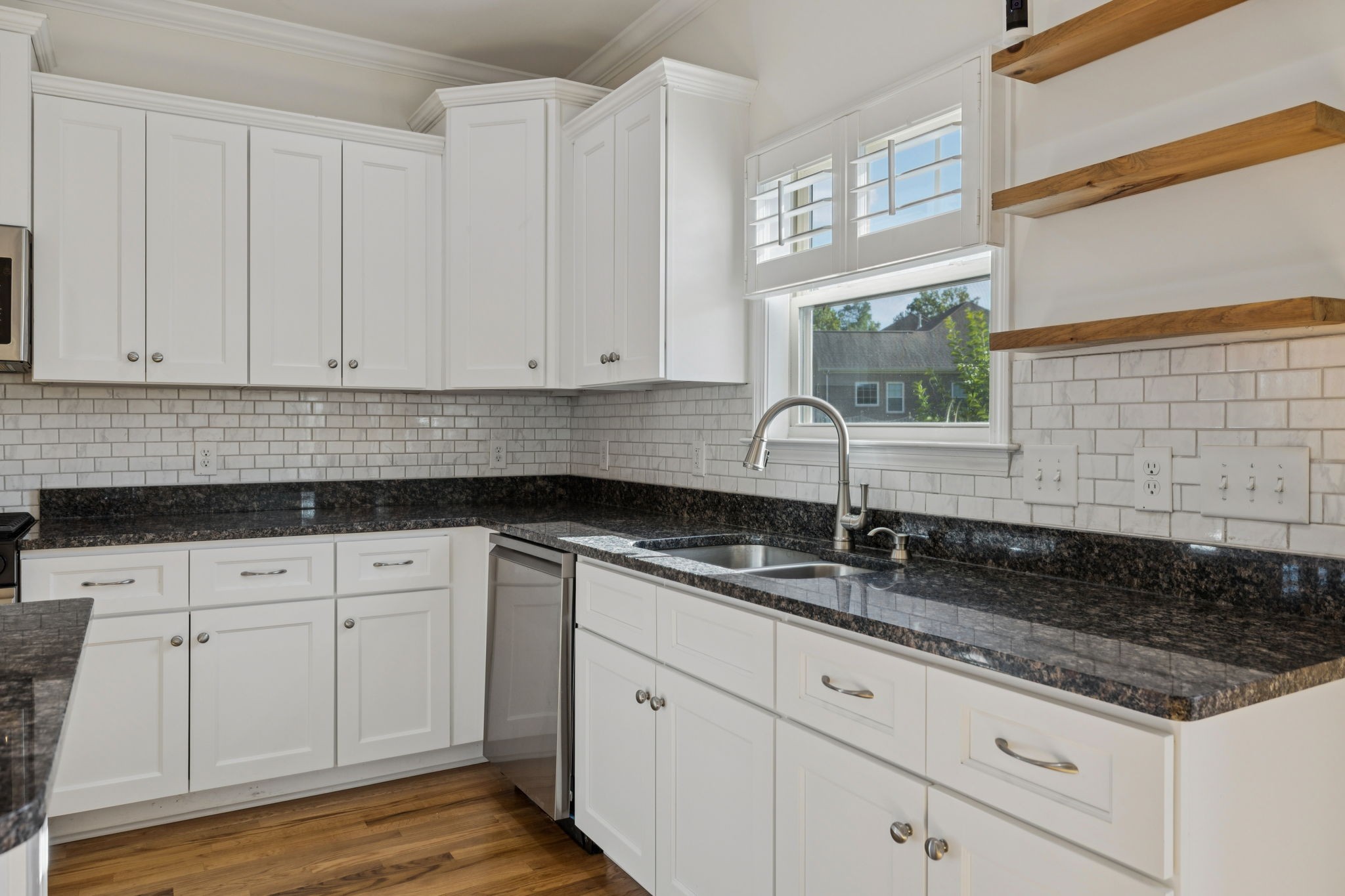 2002 Virgle Circle Spring Hill, TN 37174 - Photo 15 of 44 a kitchen with granite countertop white cabinets and a sink