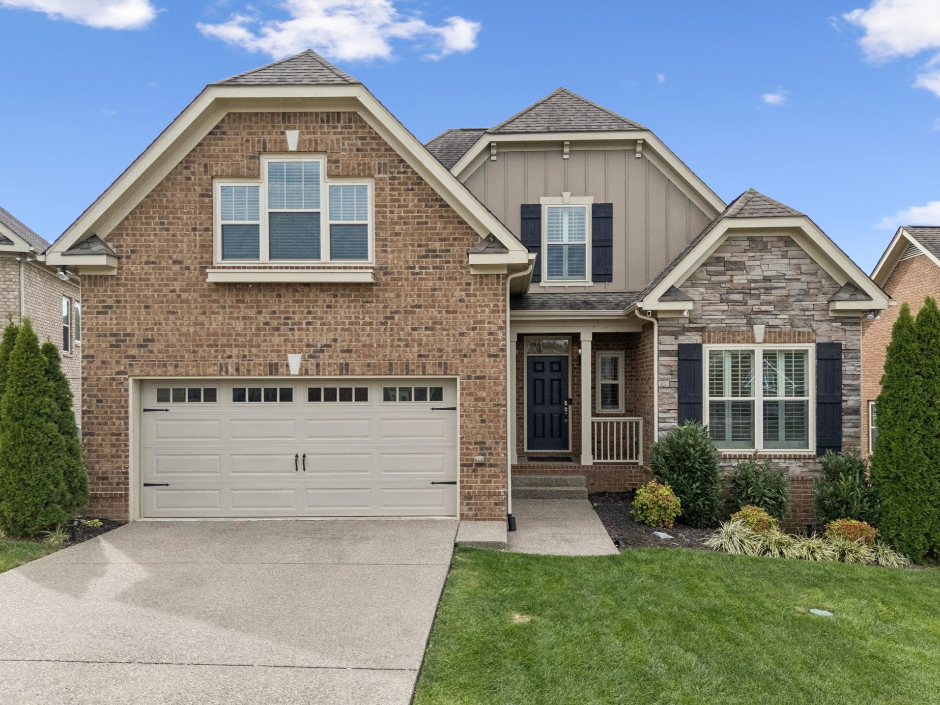 2002 Virgle Circle Spring Hill, TN 37174 - Photo 2 of 44 a front view of a house with a yard