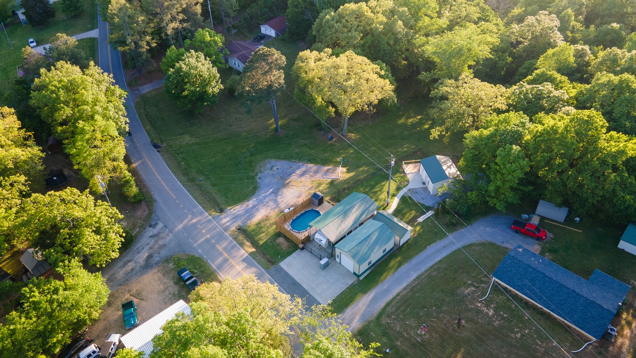 601 Pumpkin Ridge Road Dover, TN 37058 - Photo 2 of 50 view of a house with a yard and a garden