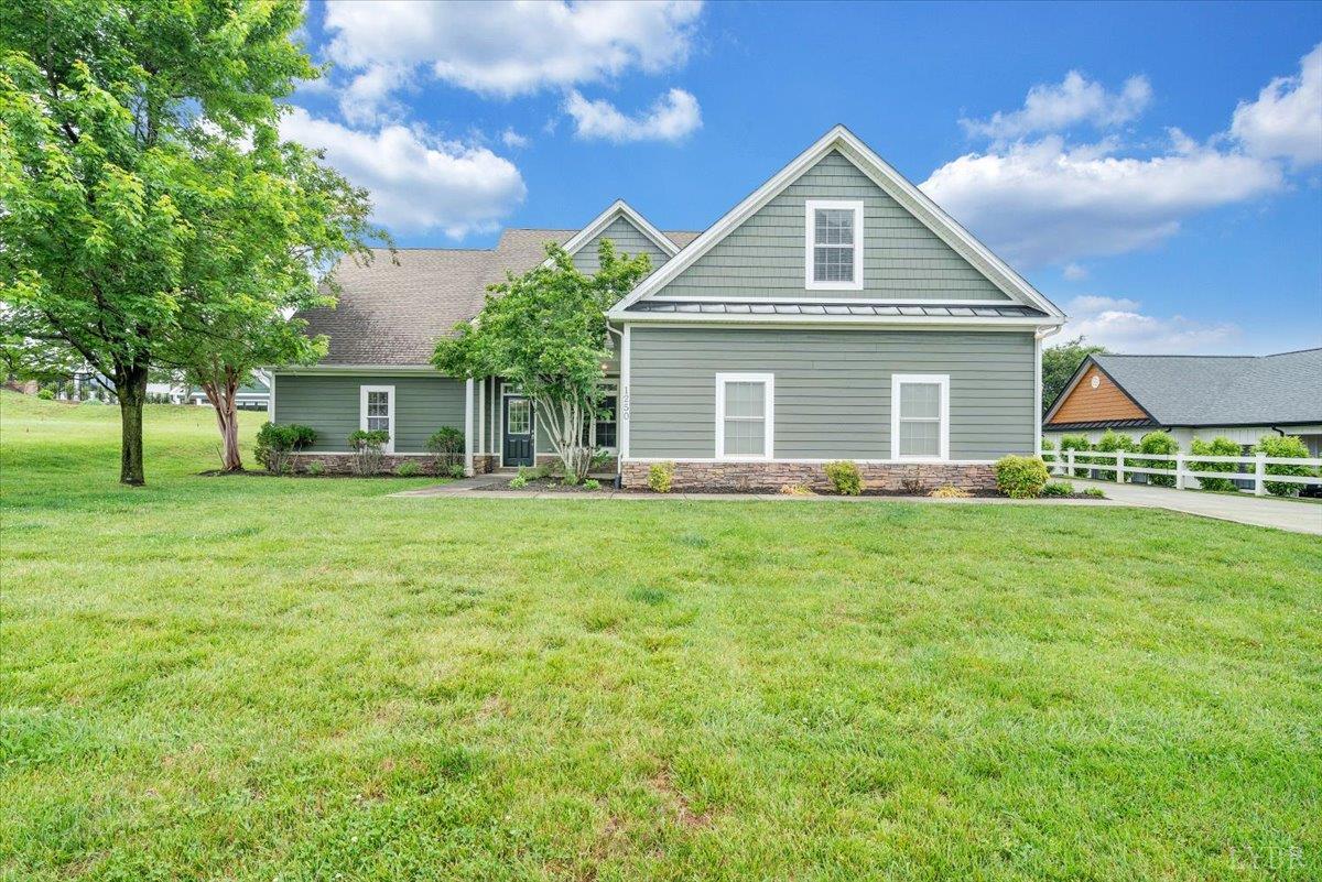 1250 Our Cove Road Huddleston, VA 24104 - Photo 54 of 70 a front view of house with a garden