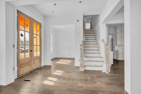a view of an entryway with stairs