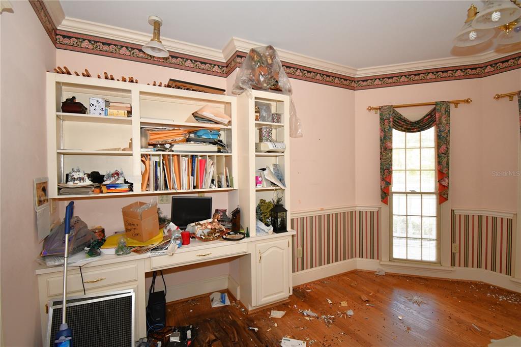 600 Old Eustis Road Mount Dora, FL 32757 - Photo 17 of 29 a bedroom with a bed and a window