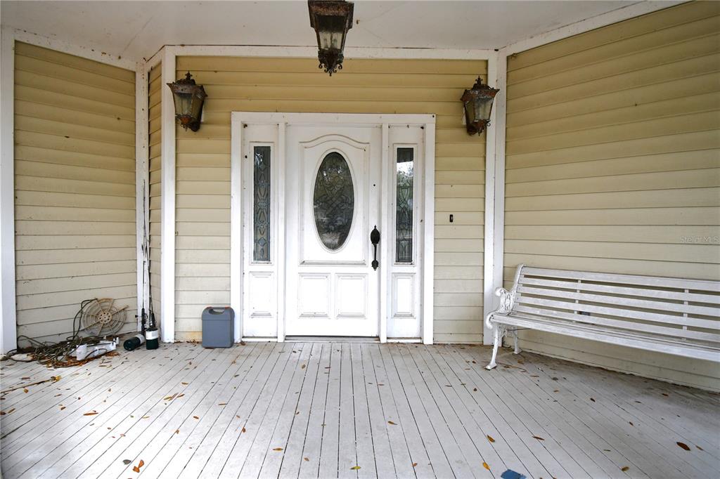 600 Old Eustis Road Mount Dora, FL 32757 - Photo 6 of 29 a view of a house with wooden floor
