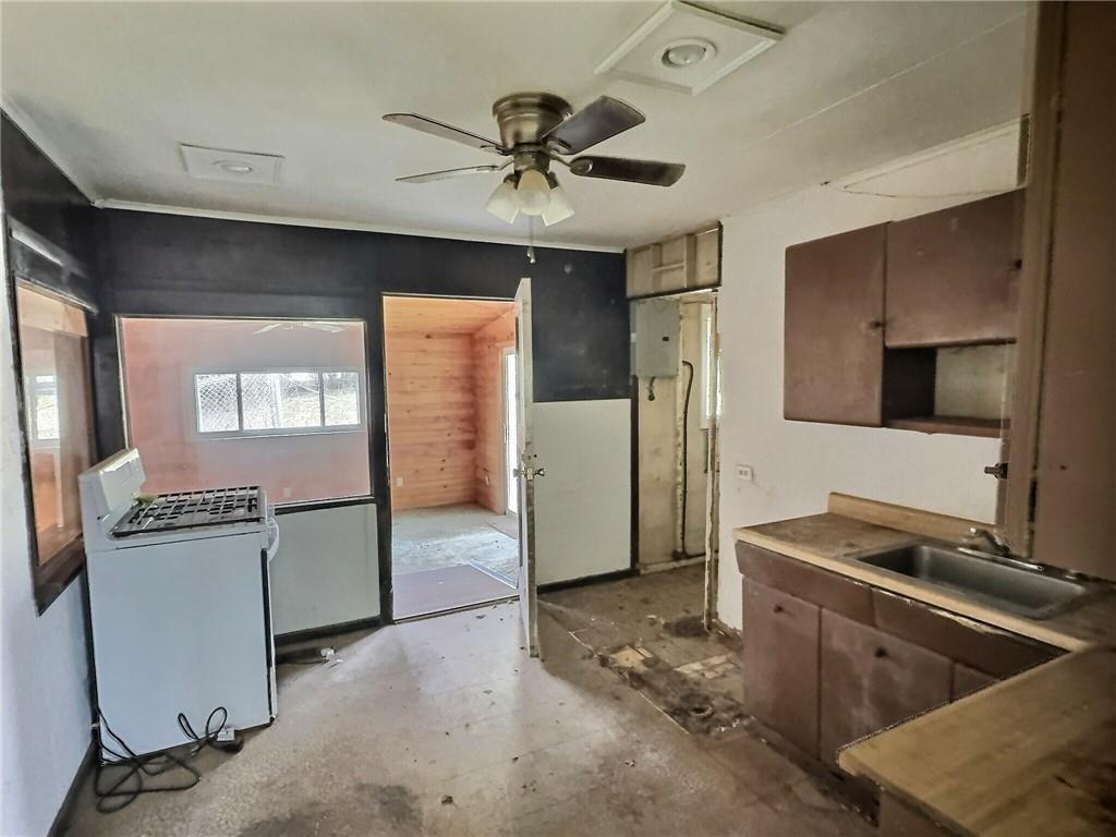 217 Summers Drive Monroeville, PA 15146 - Photo 4 of 13 a kitchen with refrigerator cabinets and stove top oven