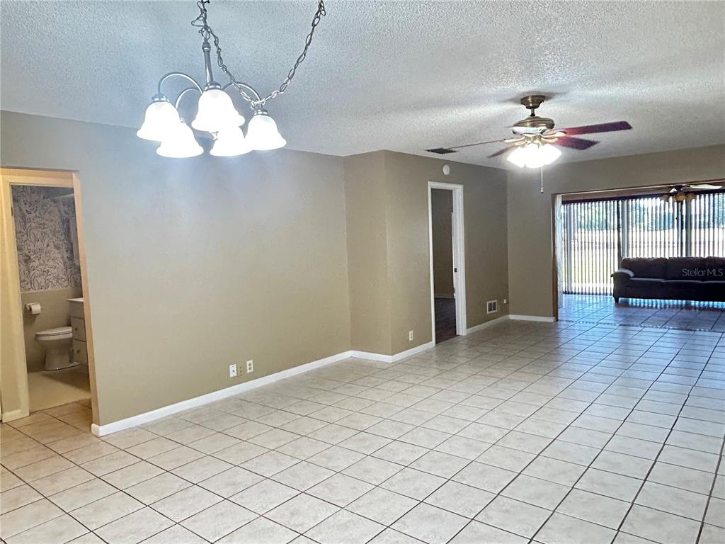 2274 Firestone Place Winter Haven, FL 33884 - Photo 7 of 25 a view of an empty room with a window