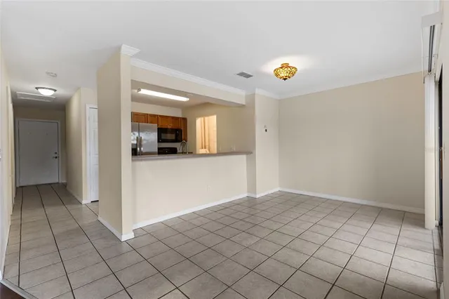 a view of a kitchen from the hallway