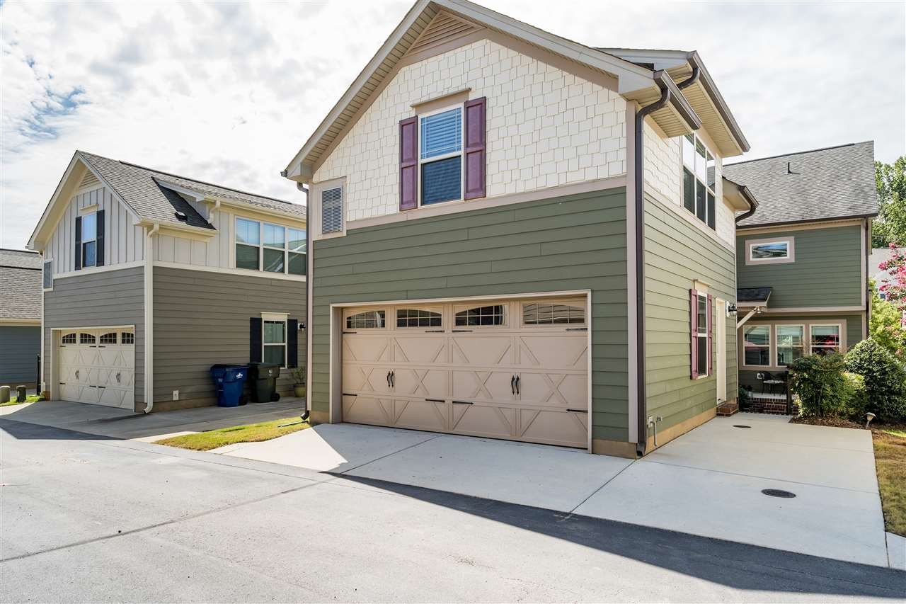 5630 Wade Park Boulevard Raleigh, NC 27607 - Photo 29 of 30 Rear alley view of your new home! Two car garage with parking pad and suite above the garage! Rear Exterior