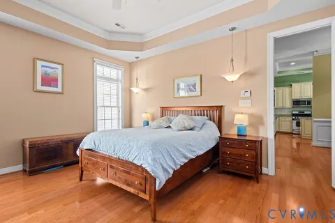 a bed room with a bed and a night stand