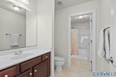 a bathroom with a bath tub