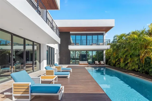 a outdoor space with patio furniture and potted plants