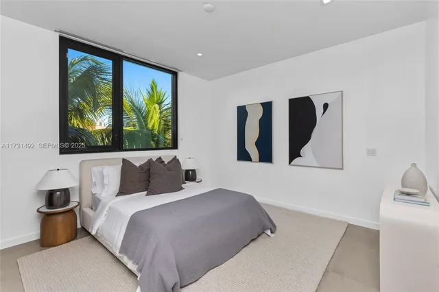 a kitchen with a sink a stove and cabinets