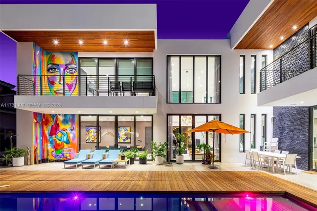 a view of swimming pool with outdoor seating