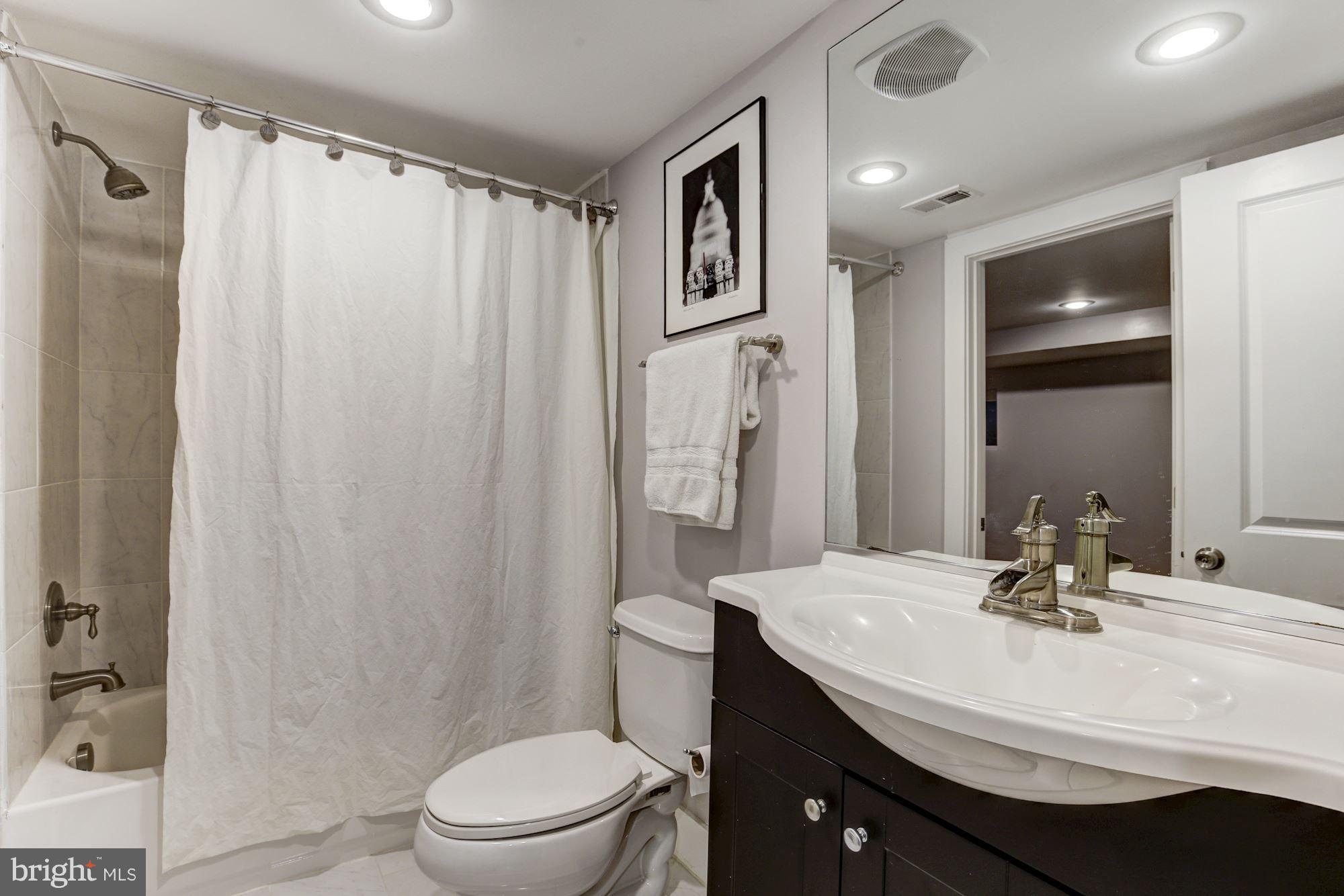 3605 13th Street Northwest Washington, DC 20010 - Photo 20 of 28 Lower level bath with dual entry to the bedroom