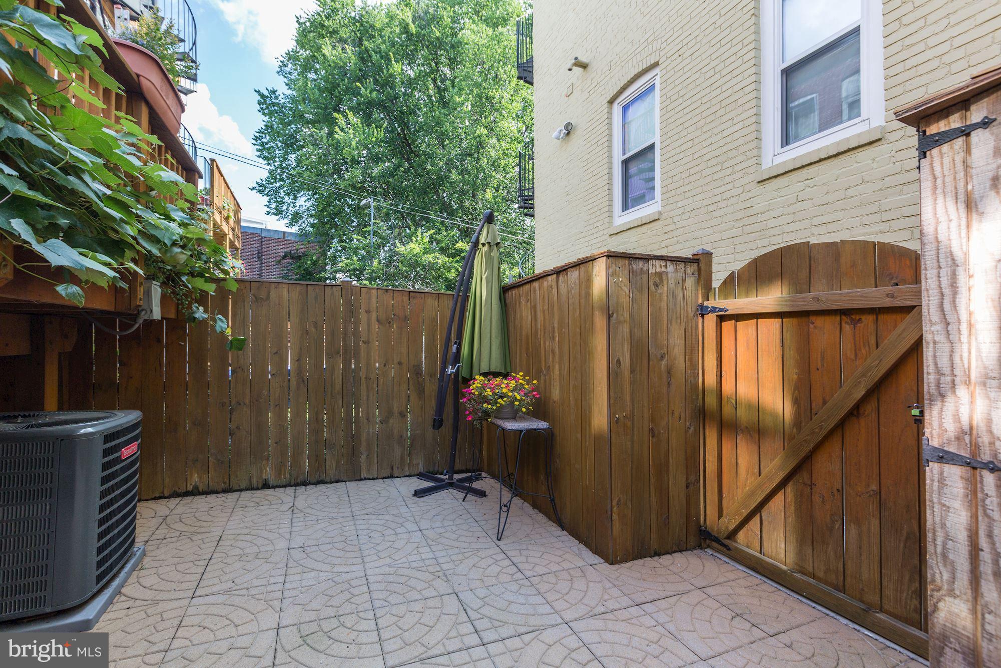 3605 13th Street Northwest Washington, DC 20010 - Photo 23 of 28 Patio with 2 sheds, fenced back yard