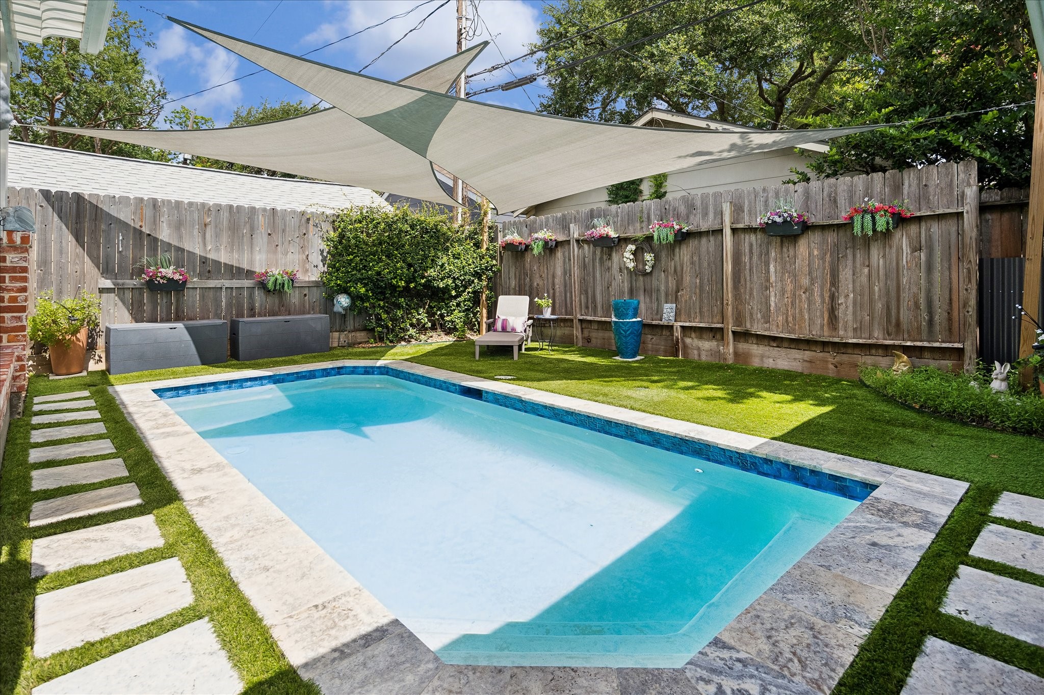 1019 East 14th Street Houston, TX 77009 - Photo 25 of 34 a view of a backyard with swimming pool and sitting area