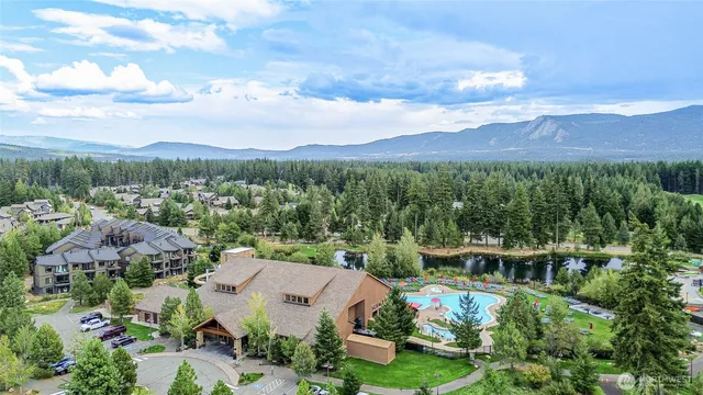 a view of house with outdoor space and garden