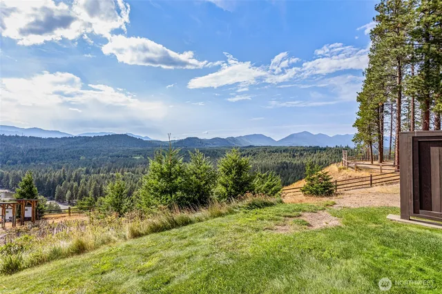 a view of a lake with mountains in the background