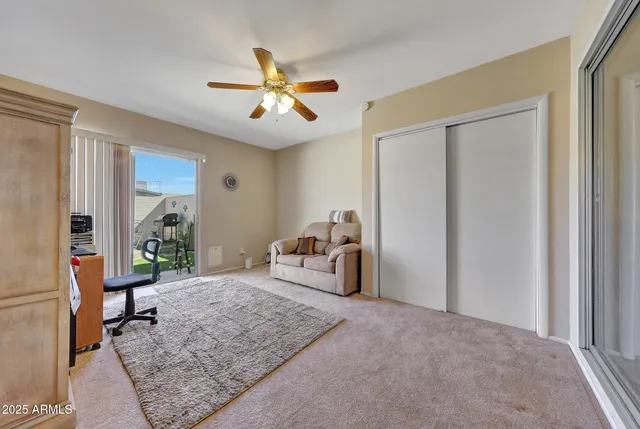 a living room with furniture and a window