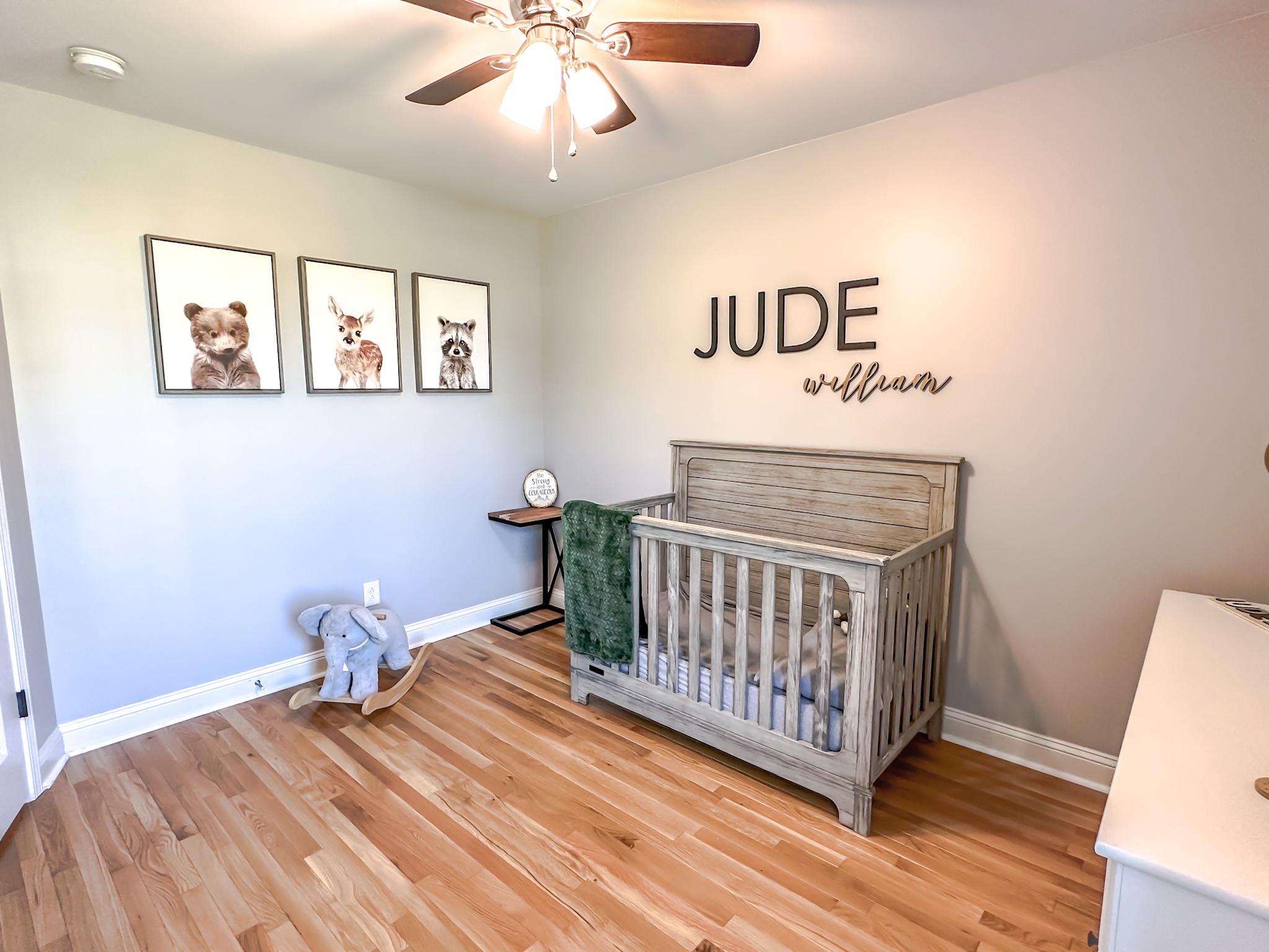 4927 Minnis Road Springfield, TN 37172 - Photo 21 of 27 a bedroom with a bed and wooden floor