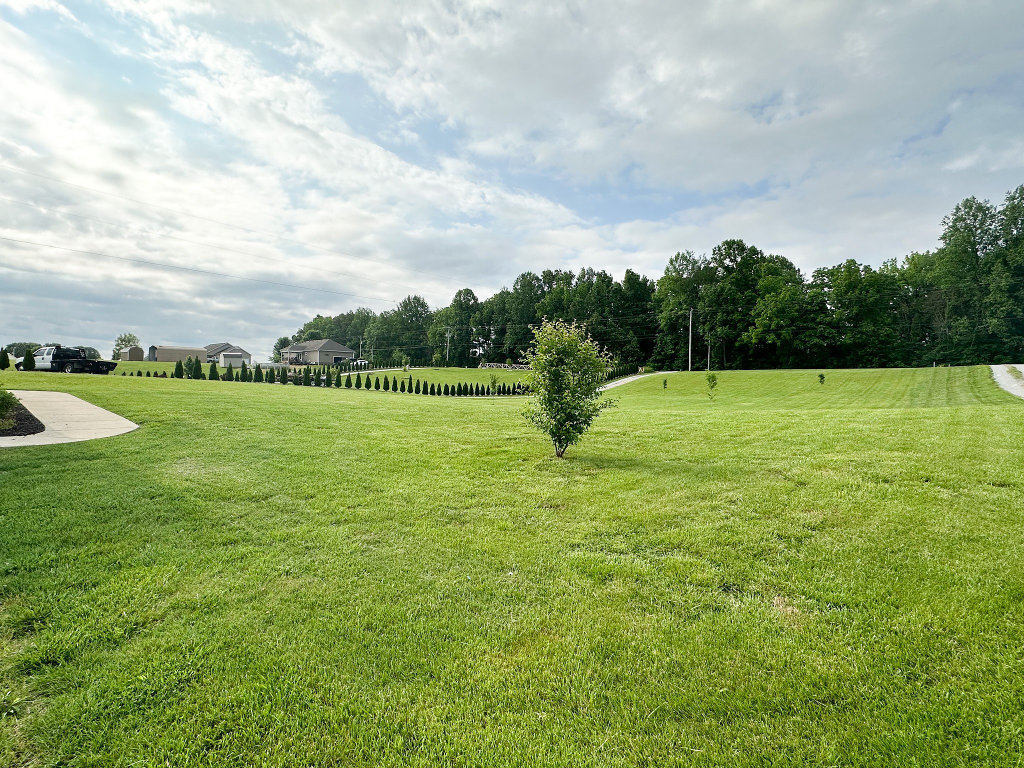4927 Minnis Road Springfield, TN 37172 - Photo 4 of 27 a view of a golf course with a lake