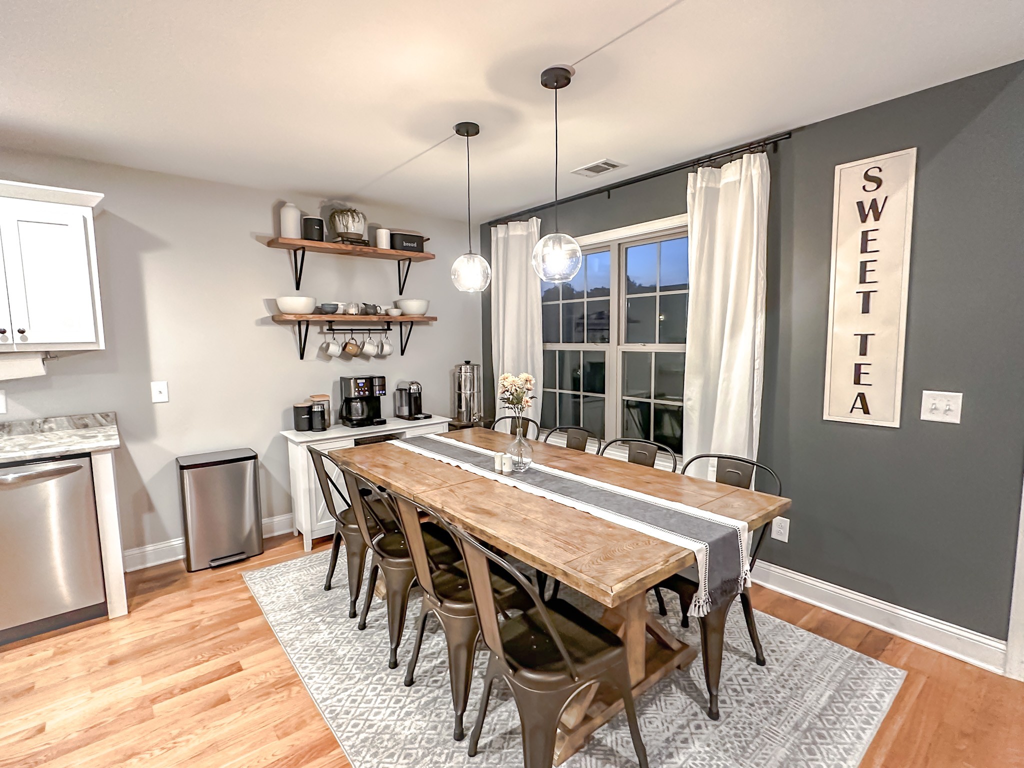 4927 Minnis Road Springfield, TN 37172 - Photo 8 of 27 a dining room with a wooden table and chairs