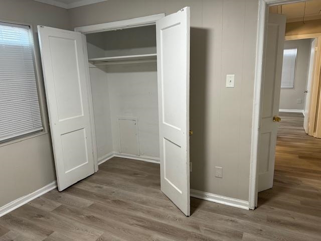 4571 Sea Isle Road Memphis, TN 38117 - Photo 8 of 12 an empty room with wooden floor