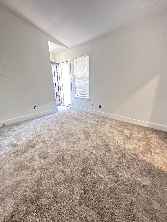 1830 River Crossing Circle, Unit C Austin, TX 78741 - Photo 13 of 16 a view of an empty room with a window