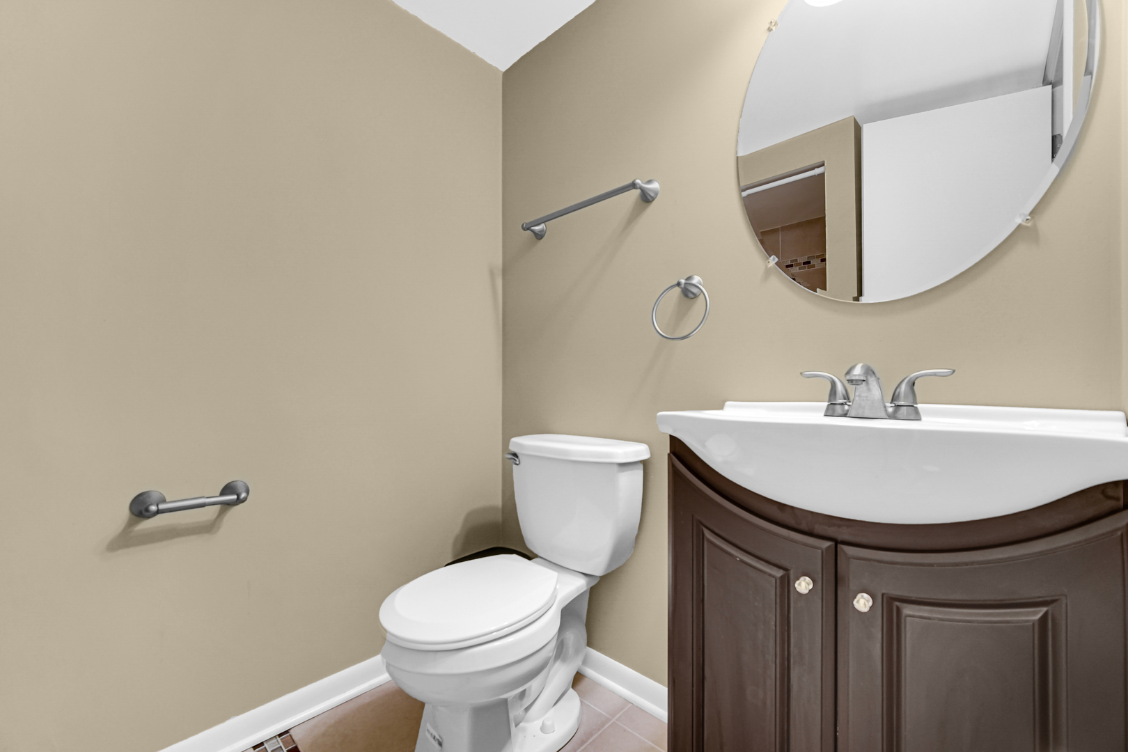 601 Northgate Road, Unit 601 New Lenox, IL 60451 - Photo 18 of 21 a bathroom with a sink toilet and a mirror