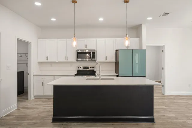 a view of bathroom with bathtub and shower