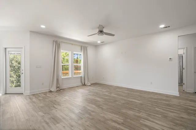 a kitchen with stainless steel appliances a refrigerator sink and microwave