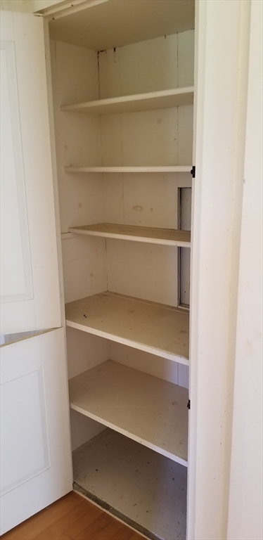16 Amherst Road Pelham, MA 01002 - Photo 11 of 17 a view of walk in closet with empty racks
