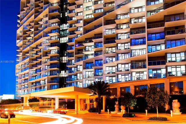 a front view of a building with a street