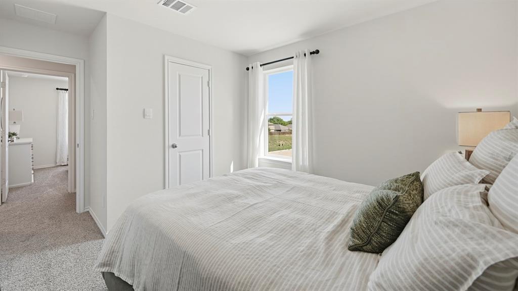 3435 Spur Run Sherman, TX 75090 - Photo 17 of 38 a bedroom with a bed and a window