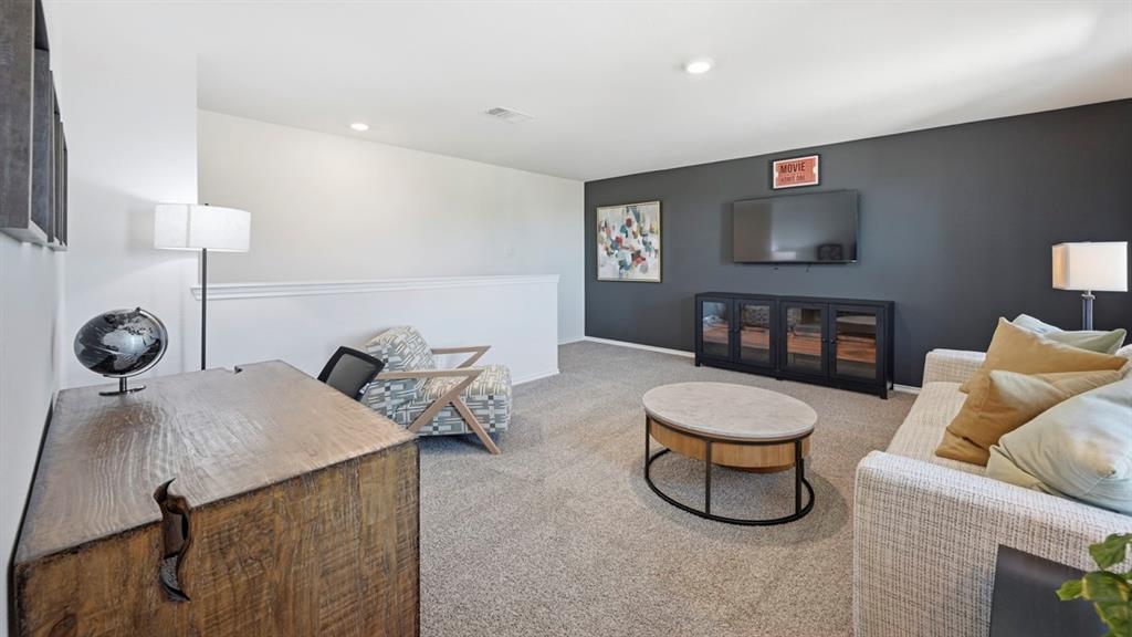 3435 Spur Run Sherman, TX 75090 - Photo 20 of 38 a living room with furniture and a wooden floor
