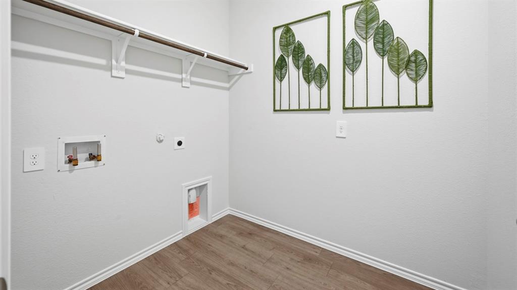 3435 Spur Run Sherman, TX 75090 - Photo 29 of 38 a view of a window with a white wall and wooden floor