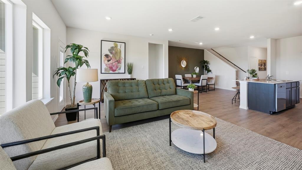 3435 Spur Run Sherman, TX 75090 - Photo 31 of 38 a living room with furniture and wooden floor