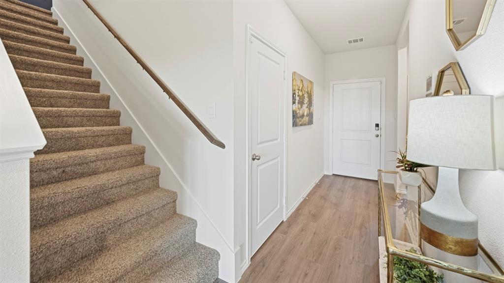 3435 Spur Run Sherman, TX 75090 - Photo 37 of 38 a view of entryway and hall with wooden floor