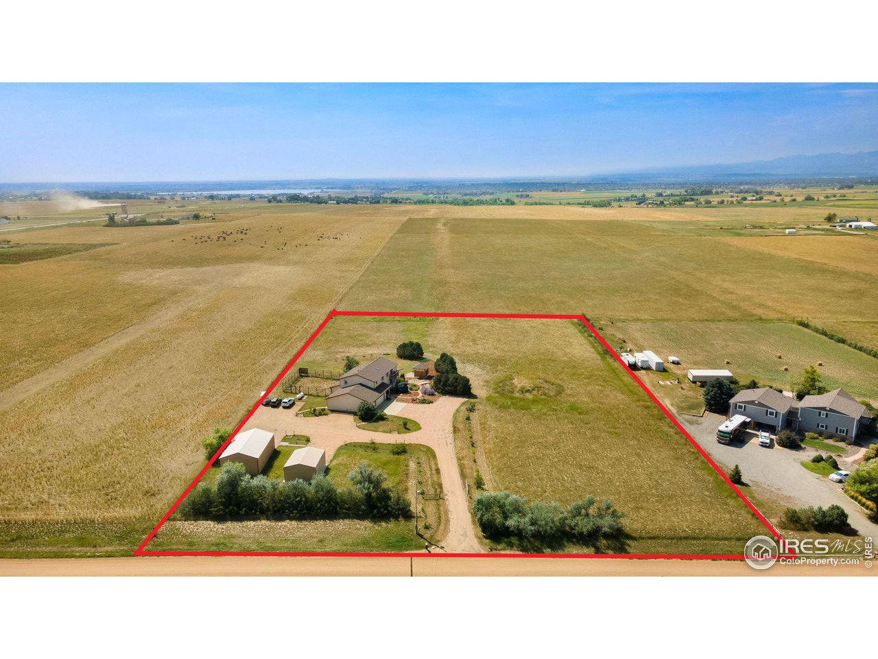 12492 Wasatch Road Longmont, CO 80504 - Photo 3 of 35 a view of an ocean and beach