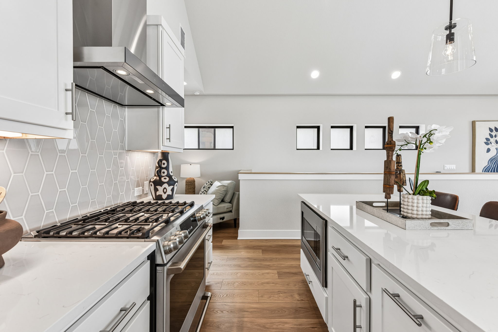 9101 Cattle Baron Path Austin, TX 78747 - Photo 15 of 40 Culinary aspirations meet contemporary design in this open-concept kitchen.