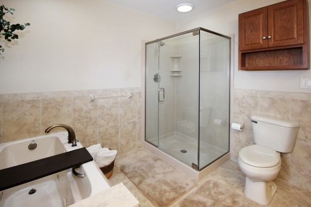 7417 East Maize Road Ridott, IL 61067 - Photo 26 of 46 a bathroom with a toilet sink and shower