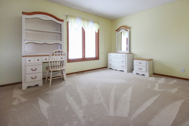 7417 East Maize Road Ridott, IL 61067 - Photo 40 of 46 a view of an empty room with a window