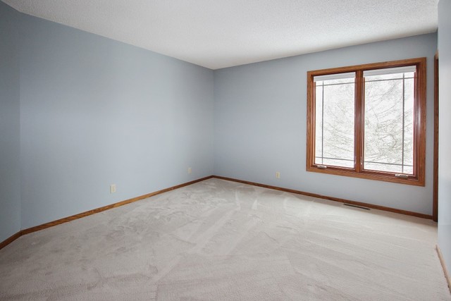 7417 East Maize Road Ridott, IL 61067 - Photo 43 of 46 an empty room with windows